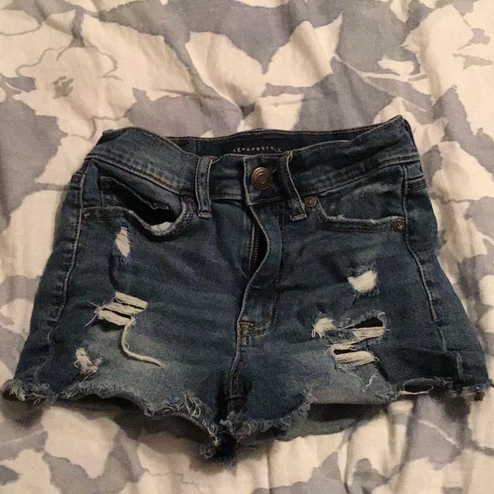 Blue ripped shorts